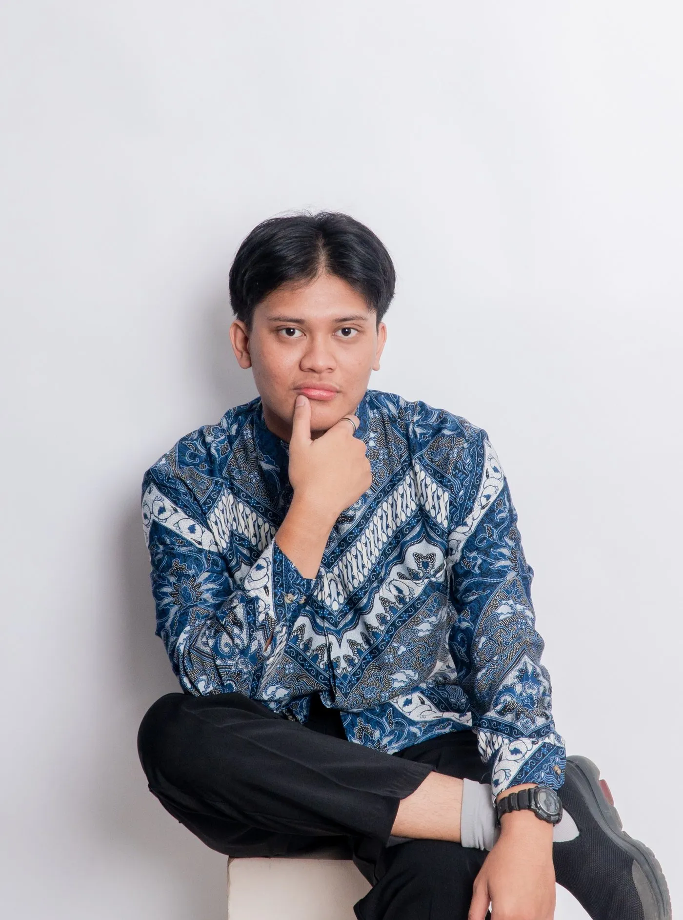 Hanif Muhammad Zhafran Sutisna, seated portrait
